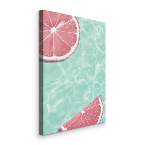 Bild Grapefruitscheiben vor dem Hintergrund von türkisfarbenem Wasser