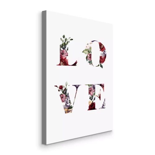 Bild Liebesschriftzug aus Blumen auf weißem Hintergrund