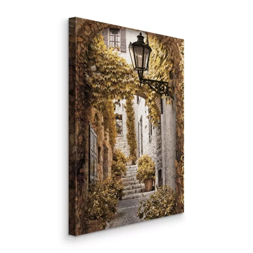 Bild Eine bezaubernde Treppe inmitten der von Pflanzen gesäumten Steinstraße