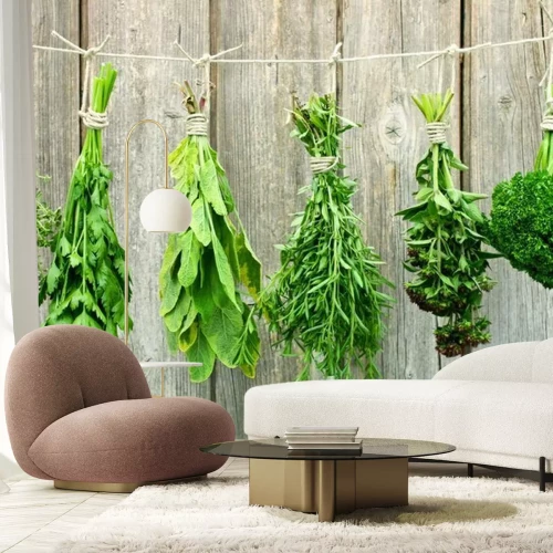 Fototapete Verschiedene Kräuter hängen zum Trocknen an einer Schnur.