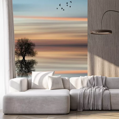 Sticker Silhouette eines Baumes im Wasser bei Sonnenuntergang