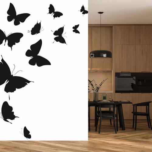 Sticker Schwarze Schmetterlinge auf hellem Hintergrund