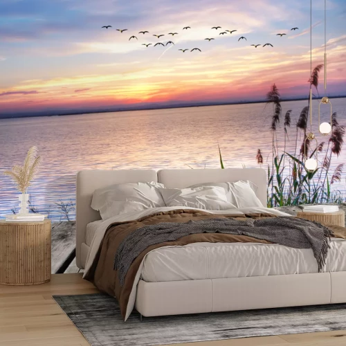 Fototapete Meerblick in den warmen Farben des Sonnenuntergangs