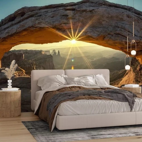 Fototapete Felsbogen an Bergspitze