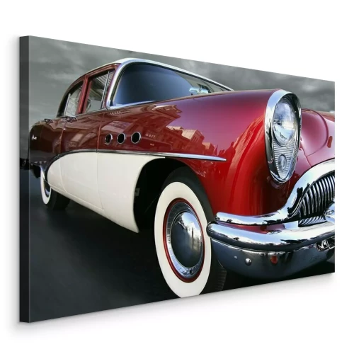 Bild Ein rotes Retro-Auto vor dunklem Himmel