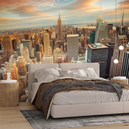 Fototapete Skyline von New York City bei Sonnenuntergang von den Bergen aus gesehen