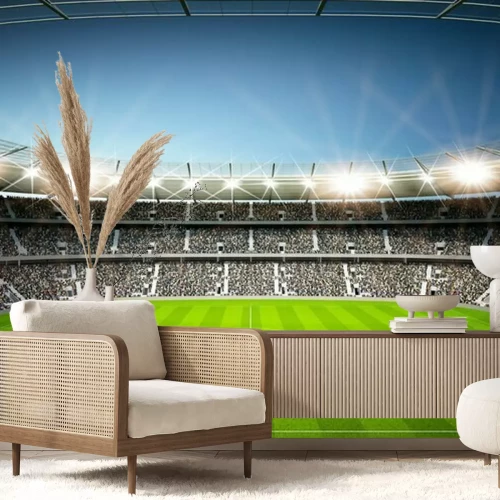 Fototapete Ein volles Fußballstadion unter Abendhimmel