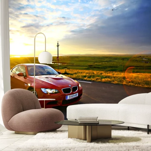 Fototapete Rotes Auto bei Sonnenuntergang