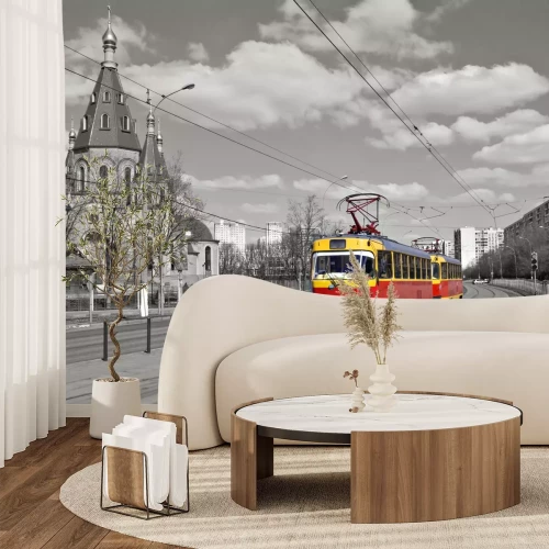 Fototapete Rot-gelbes Fahrzeug auf grauem Hintergrund