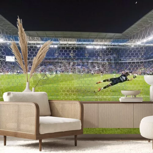 Fototapete Ein Torwart hechtet in der Abwehr nach dem Ball