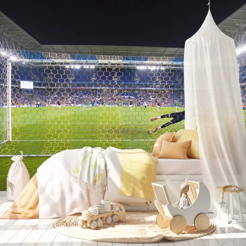 Fototapete Ein Torwart hechtet in der Abwehr nach dem Ball