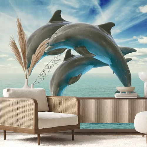 Sticker Drei Delfine über dem Wasser