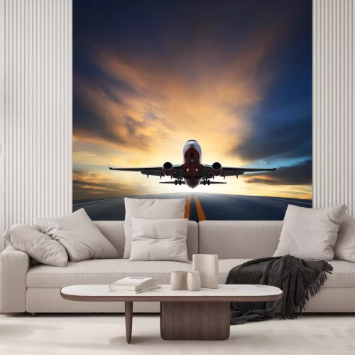 Fototapete Ein Passagierflugzeug über einer Landebahn