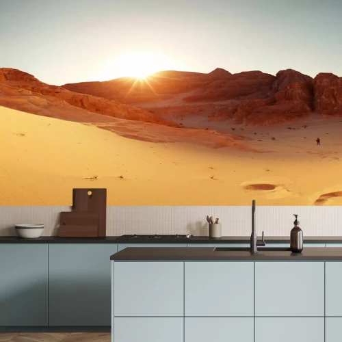 Fototapete Eine Wüstenlandschaft mit Sonnenuntergang