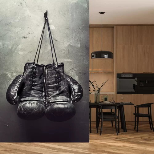Fototapete Schwarze Handschuhe am Haken