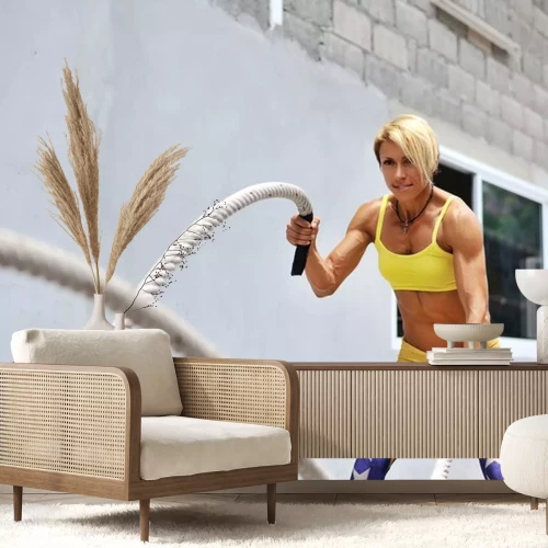 Sticker Sportlich junge Frau macht einige Übungen crossfit mit einem Seil o