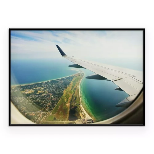 Poster Blick aus dem Flugzeugfenster auf die Halbinsel und den Flügel.