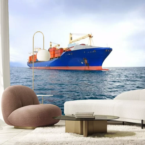 Fototapete Blaues Containerschiff auf See
