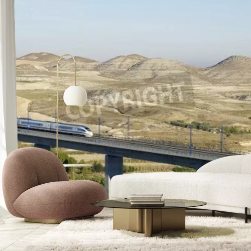 Fototapete Rasender Zug auf hoher Talbrücke