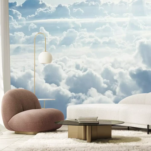 Sticker Blick von oben auf weiße flauschige Wolken