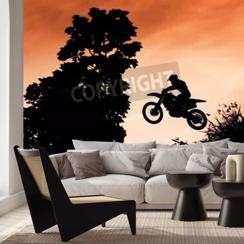 Fototapete Motocross-Springen bei Sonnenuntergang