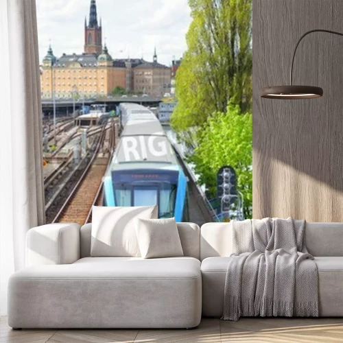 Fototapete Blauer Zug in Innenstadt