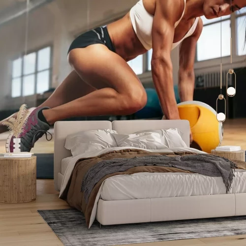 Fototapete Sportliche Frau beim Training im Fitnessstudio