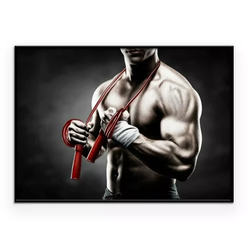 Poster Sportlicher Mann mit einem roten Springseil