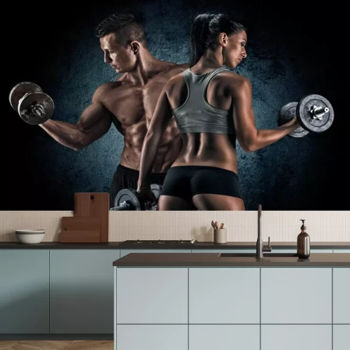 Fototapete Sportliches Paar im Fitnessstudio