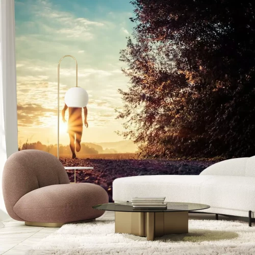 Fototapete Ein Läufer auf einem Pfad bei Sonnenaufgang