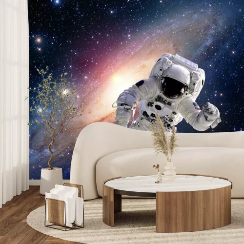 Fototapete Astronaut im Weltraum vor dem Hintergrund einer Galaxie