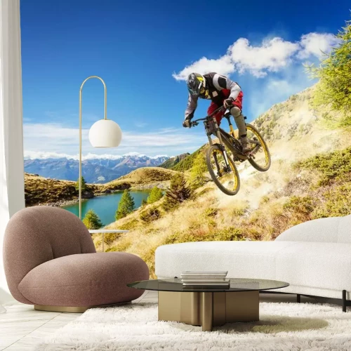 Sticker Ein Radfahrer fährt einen Hang hinunter