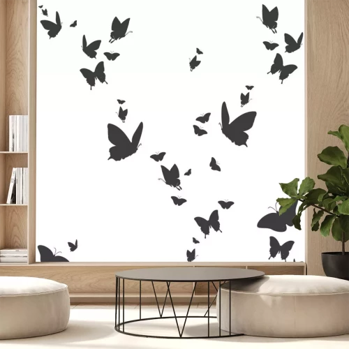 Sticker Kleine und große schwarze Schmetterlinge