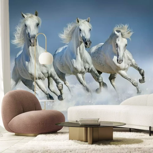 Sticker Weiße Pferde galoppieren im Schnee