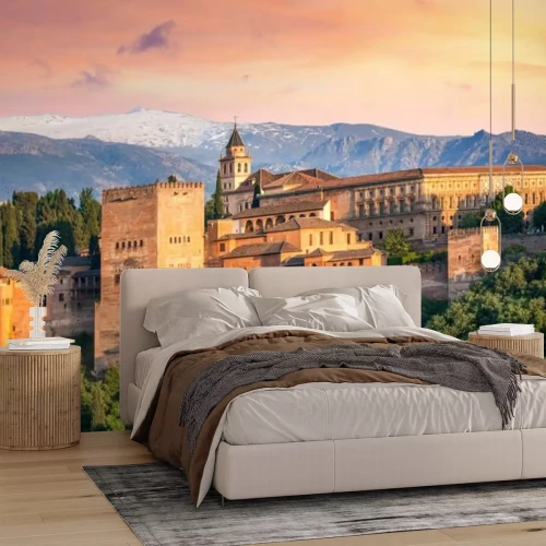 Fototapete Eine Festung mit Bergen im Hintergrund