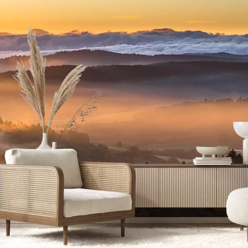 Fototapete Berge und niedrige Wolken