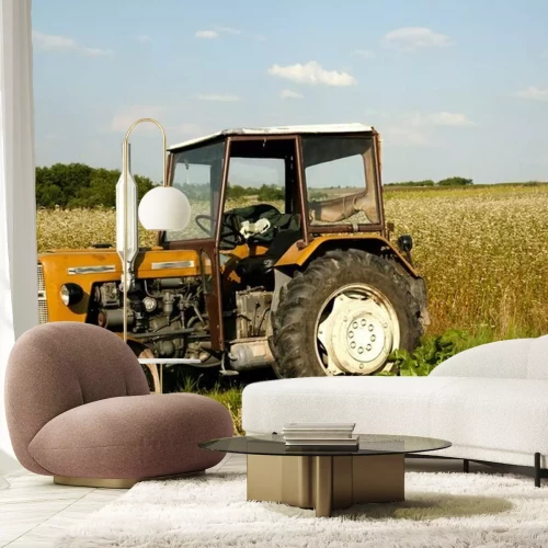 Sticker Alter Traktor, der auf einem ländlichen Feld arbeitet