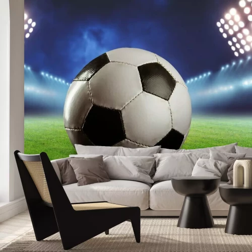 Fototapete Eine Nahaufnahme eines Fußballs auf einem Feld