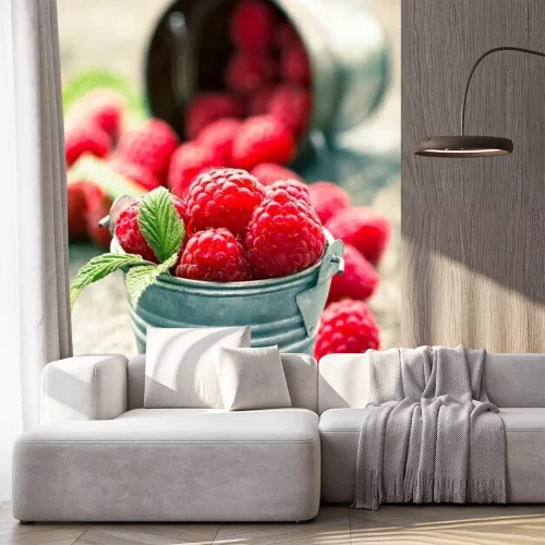 Fototapete Himbeeren in den kleinen Eimer