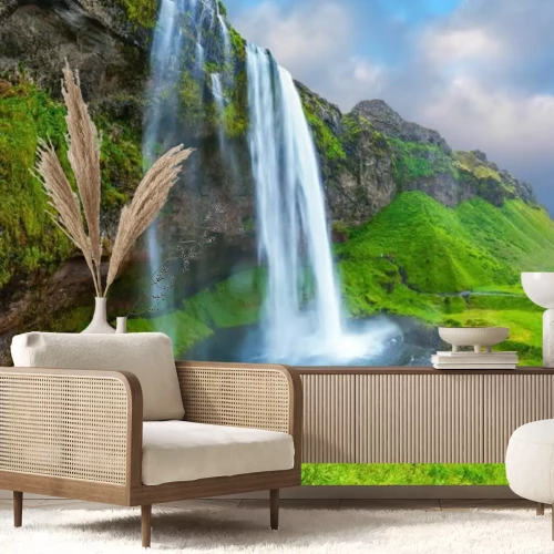 Fototapete Ein Wasserfall auf einem hohen Berggipfel