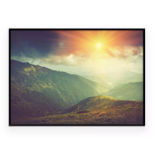 Poster Ein malerischer Sonnenaufgang über den Berggipfeln.