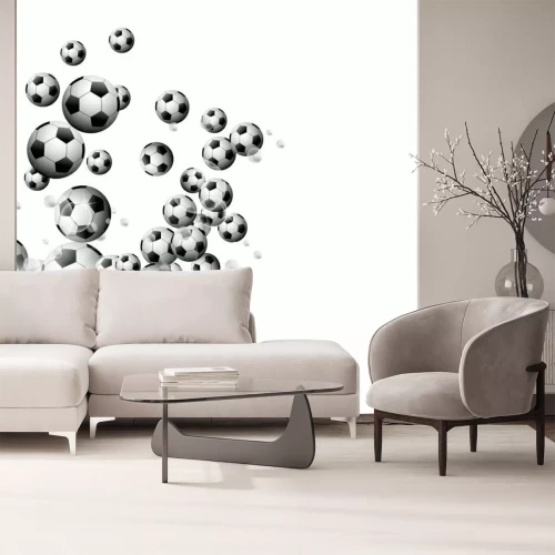 Fototapete Fußbälle in der Sonne auf weißem Hintergrund