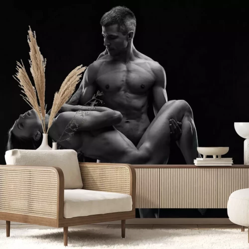 Fototapete Akt eines sportlichen Paares auf schwarzem Hintergrund