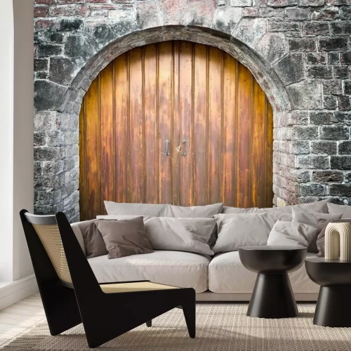 Fototapete Breiter Tor auf Mauerhintergrund