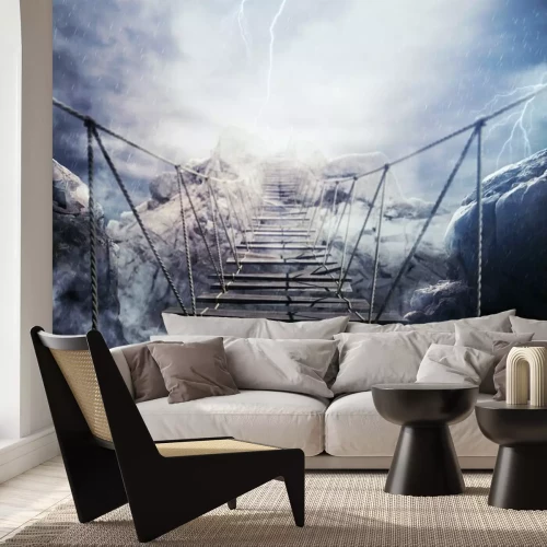 Fototapete Eine Hängebrücke im Sturm über einem Abgrund