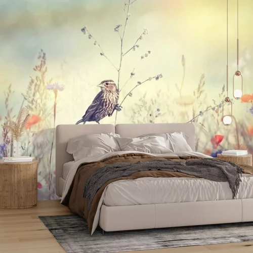 Fototapete Vogel auf einem Ast im Feld