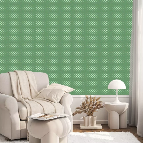 Tapete Grünes Motiv mit weißen Tupfen