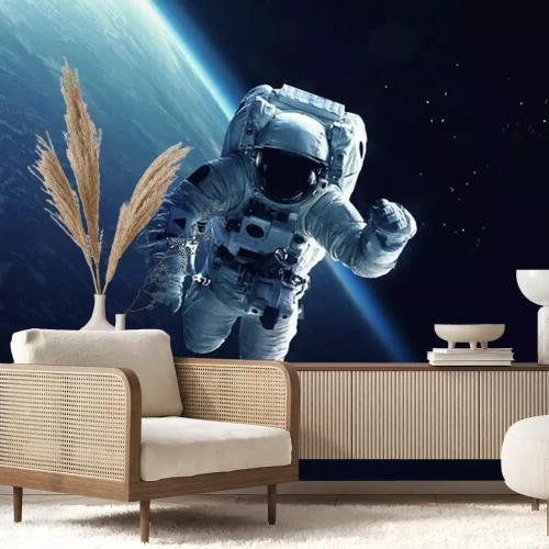 Fototapete Kosmonaut mit der Erde im Hintergrund