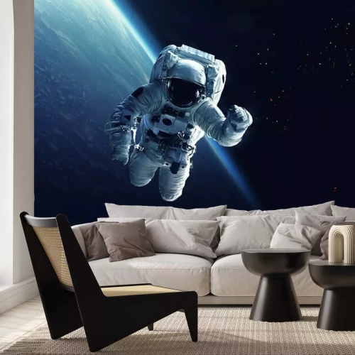 Sticker Kosmonaut mit der Erde im Hintergrund