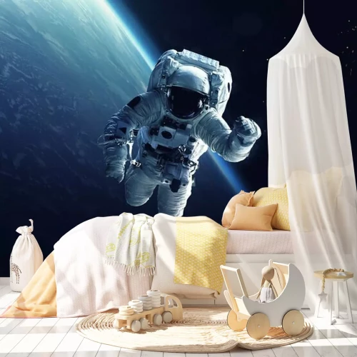 Fototapete Kosmonaut mit der Erde im Hintergrund